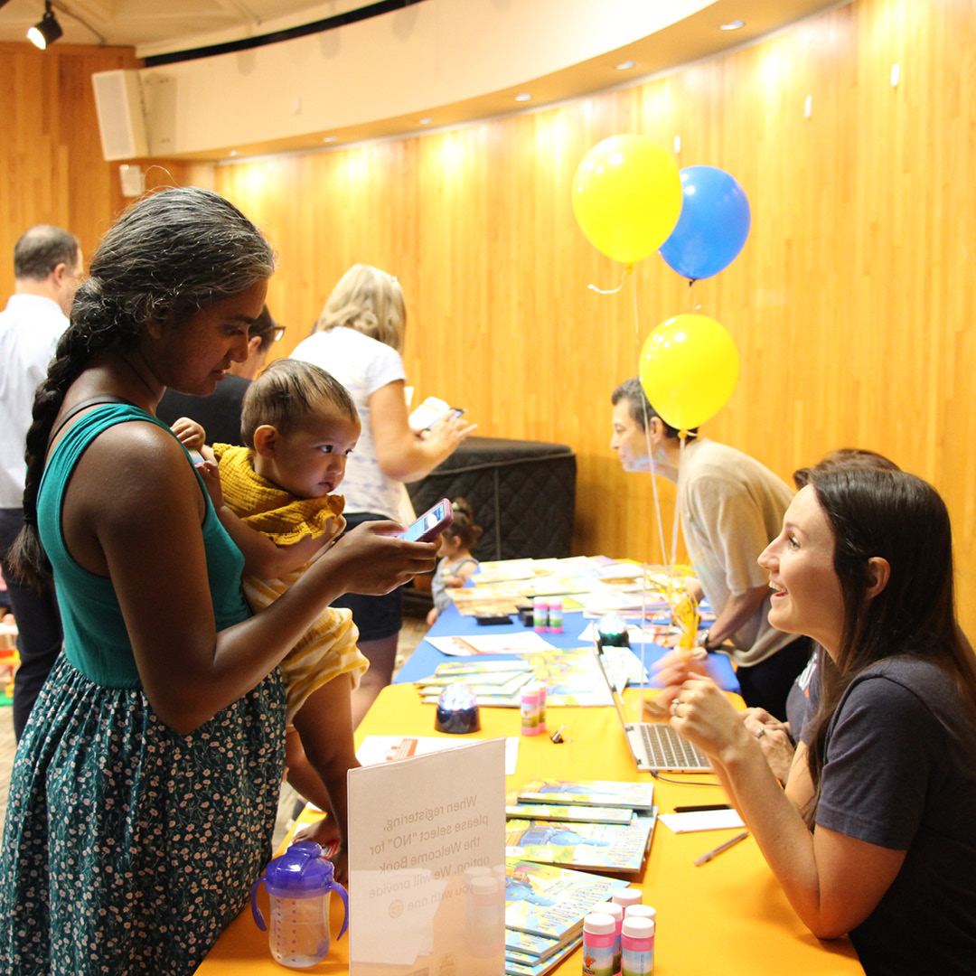 Mother signing up child for DPIL